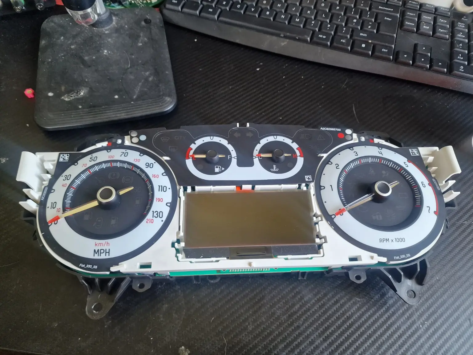 Instrument cluster undergoing bench repair